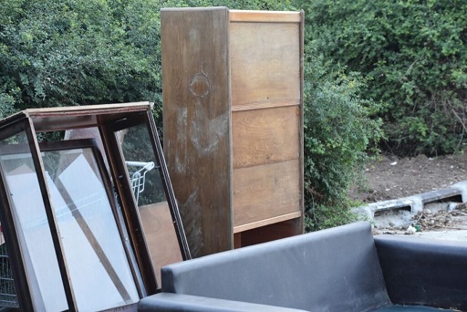 Start by filling up the front of the dumpster - Dumpster Rental Providence RI